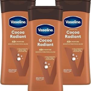 The product image shows a 400ml bottle of Vaseline Intensive Care Cocoa Radiant lotion. The bottle is light brown with the Vaseline logo at the top, followed by the product name "Intensive Care Cocoa Radiant." Below, there’s a brief description highlighting its ability to moisturize and nourish dry skin, leaving it soft and radiant. The bottle has a pump dispenser for easy application, and the overall design emphasizes warmth and hydration, with subtle cocoa bean imagery to suggest its cocoa butter infusion.