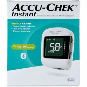 Accu-Chek Instant blood glucose monitor displayed on a clean, white background. The device features a large, easy-to-read digital display showing a glucose reading, with a single test strip inserted into the slot at the bottom. The compact, portable design of the monitor emphasizes its user-friendly interface, with a prominent power button visible. This image highlights the simplicity and accuracy of the device for daily diabetes management.